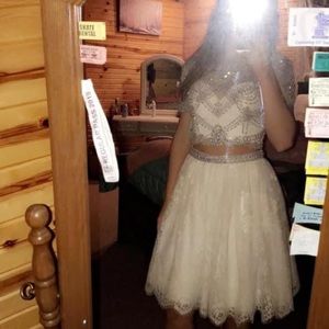 Only worn to try on, color ivory, sherri hill, size 4